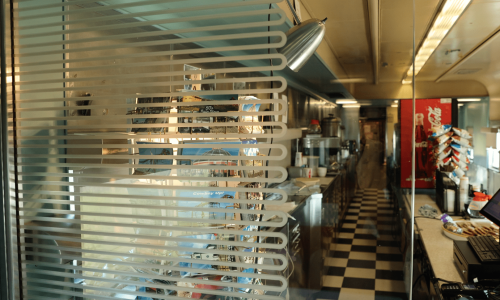 View behind the counter of the 50s style train diner at 1880 Town
